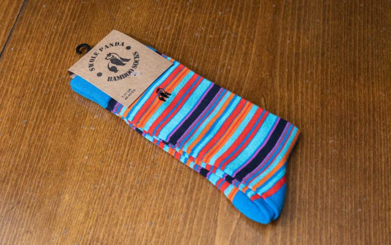 Swole Panda bamboo sock, blue with red, orange and purple stripes