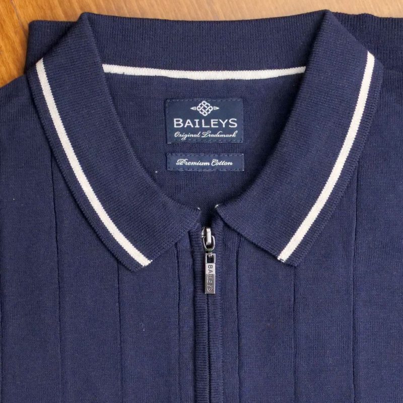 Baileys short sleeved polo shirt in dark blue with white detail on collar