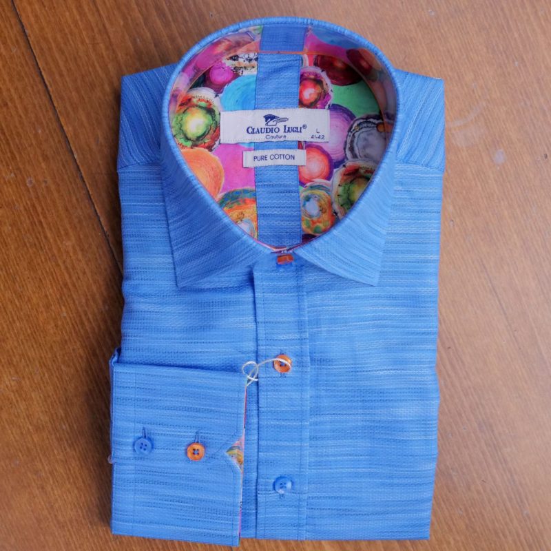 Claudio Lugli shirt in mid blue with ribbed effect coloured buttons and multicoloured lining from Gabucci Menswear Bath