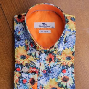 Claudio Lugli shirt with large bright flowers red buttons and an orange lining from Gabucci menswear Bath