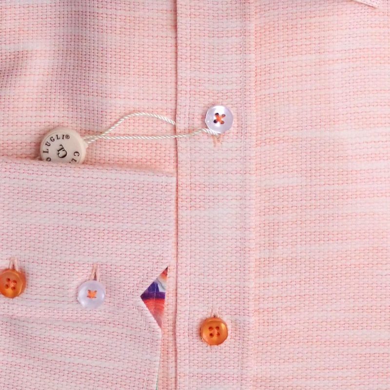 Claudio Lugli shirt in peach with ribbed effect coloured buttons and multicoloured lining. From Gabucci Menswear Bath.