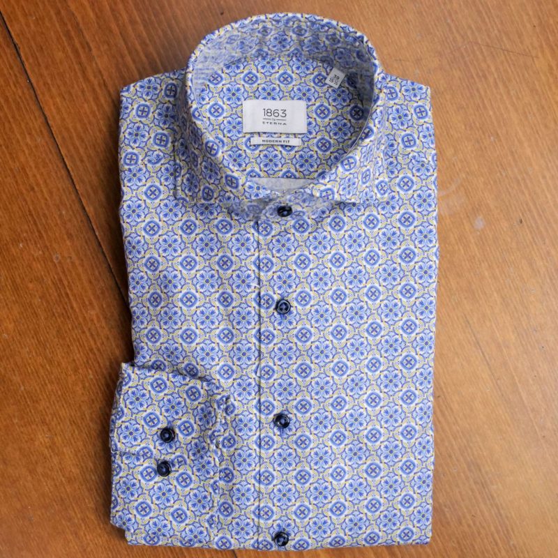 Eterna shirt with intricate design in blue and yellow