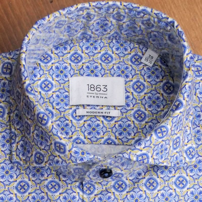 Eterna shirt with intricate design in blue and yellow