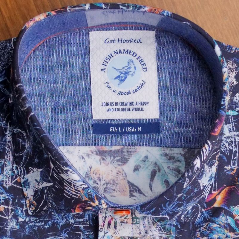 A Fish Named Fred shirt with multi coloured vintage VW campers and foliage on blue cotton. Very stylish.From Gabucci Menswear Bath