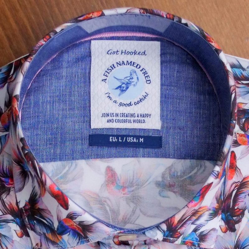 A Fish Named Fred shirt with exotic coloured fish on white cotton. From Gabucci Menswear Bath