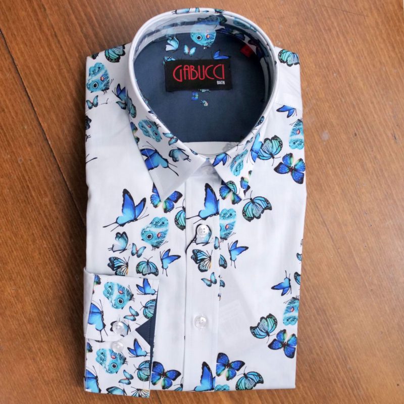 Gabucci shirt with bright blue and butterflies on white.