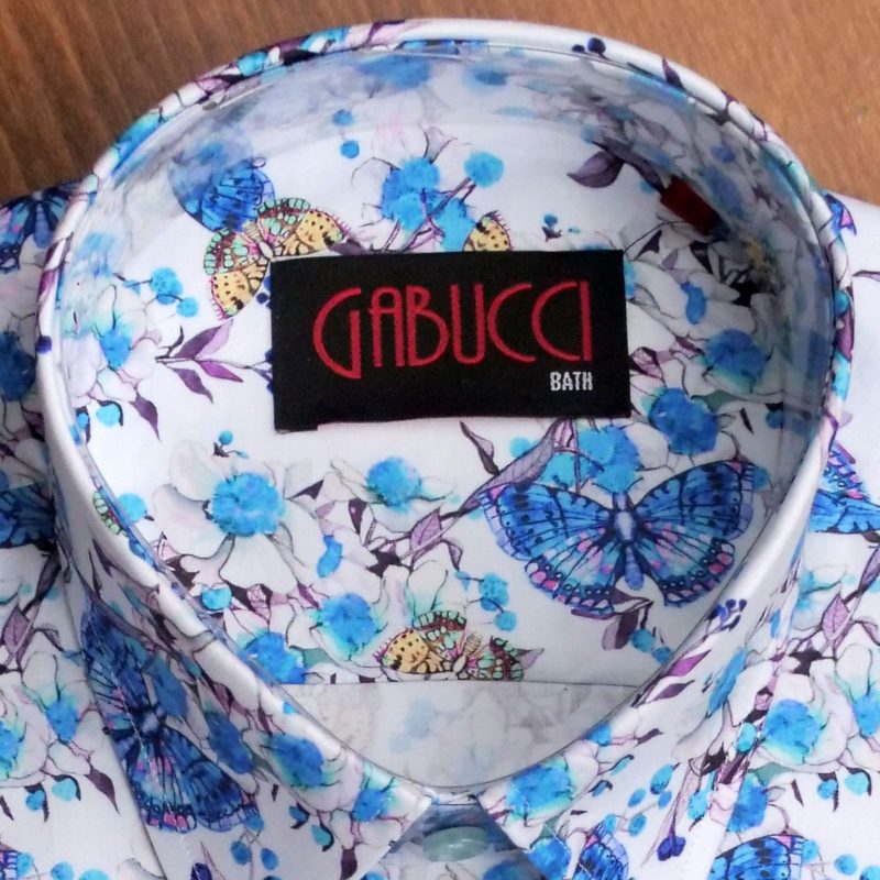 Gabucci shirt with blue and pink butterflies on blue foliage on white