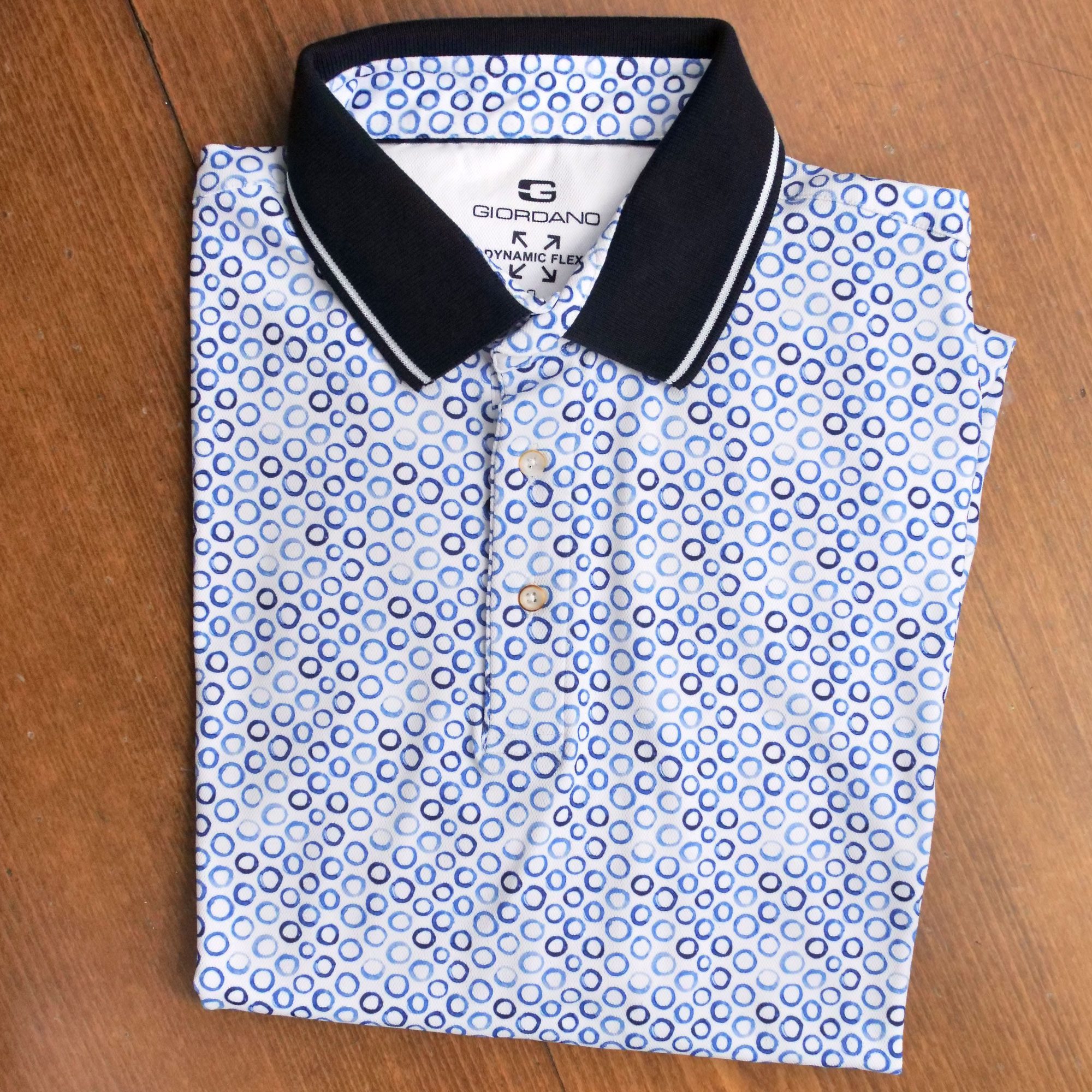 Giordano short sleeved polo shirt with blue circles on white with a ...