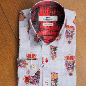 Claudio Lugli shirt in grey with skulls in crowns wearing jewellery and masks with a red patterned lining from Gabucci Menswear Bath