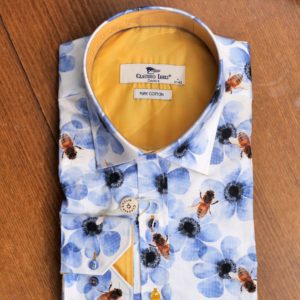 Claudio Lugli shirt with large bumble bees on blue flowers on white with a yellow lining from Gabucci Menswear Bath