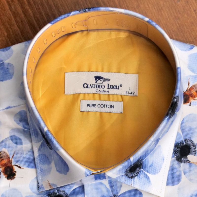 Claudio Lugli shirt with large bumble bees on blue flowers on white with a yellow lining from Gabucci Menswear Bath