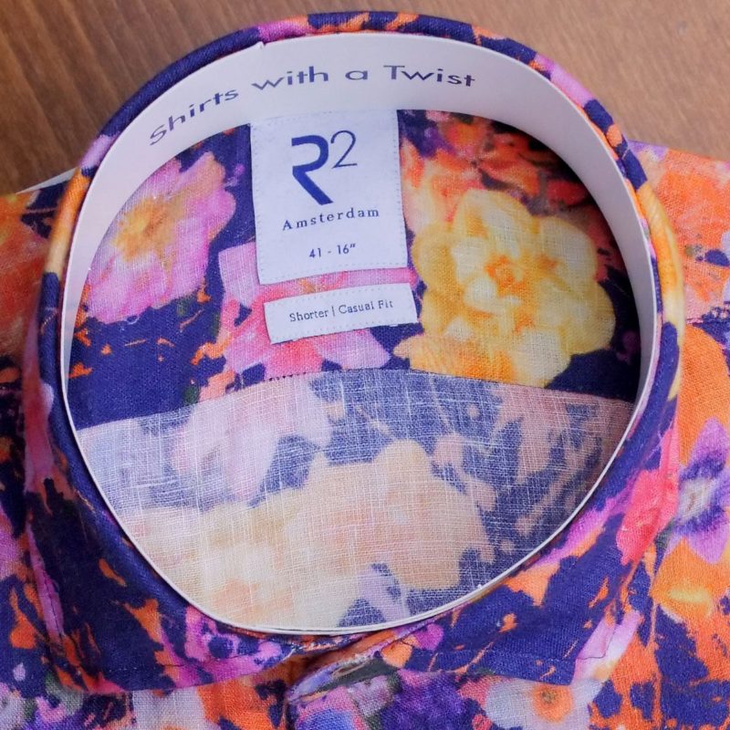 R2 shirt with pink and orange flowers on blue