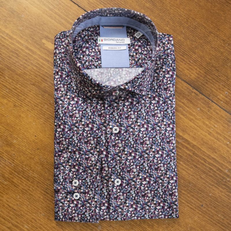 Giordano shirt with small blue and red circles on a dark background