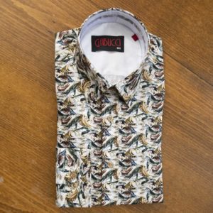 Gabucci shirt with blue and green whales in a big sea, on white