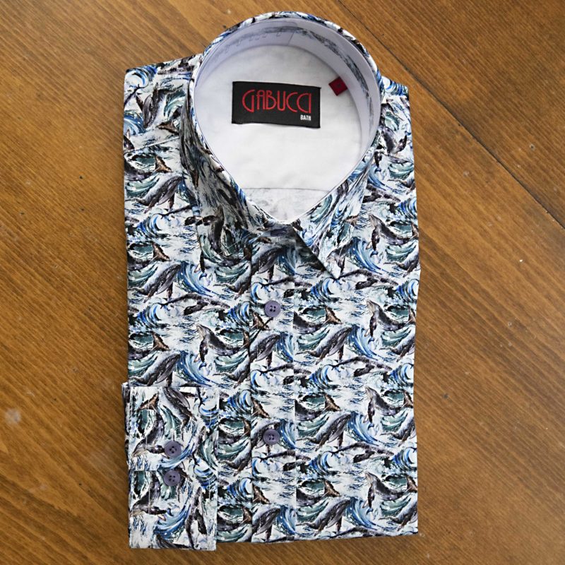 Gabucci shirt with grey whales in a big blue sea, on white