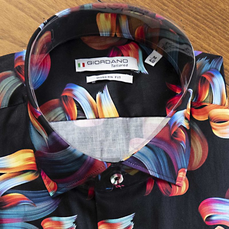 Giordano shirt with large colourful swirls on black