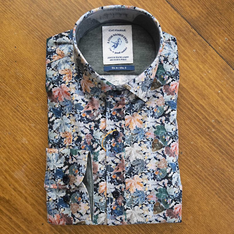 A Fish Named Fred shirt with autumn foliage on pale grey