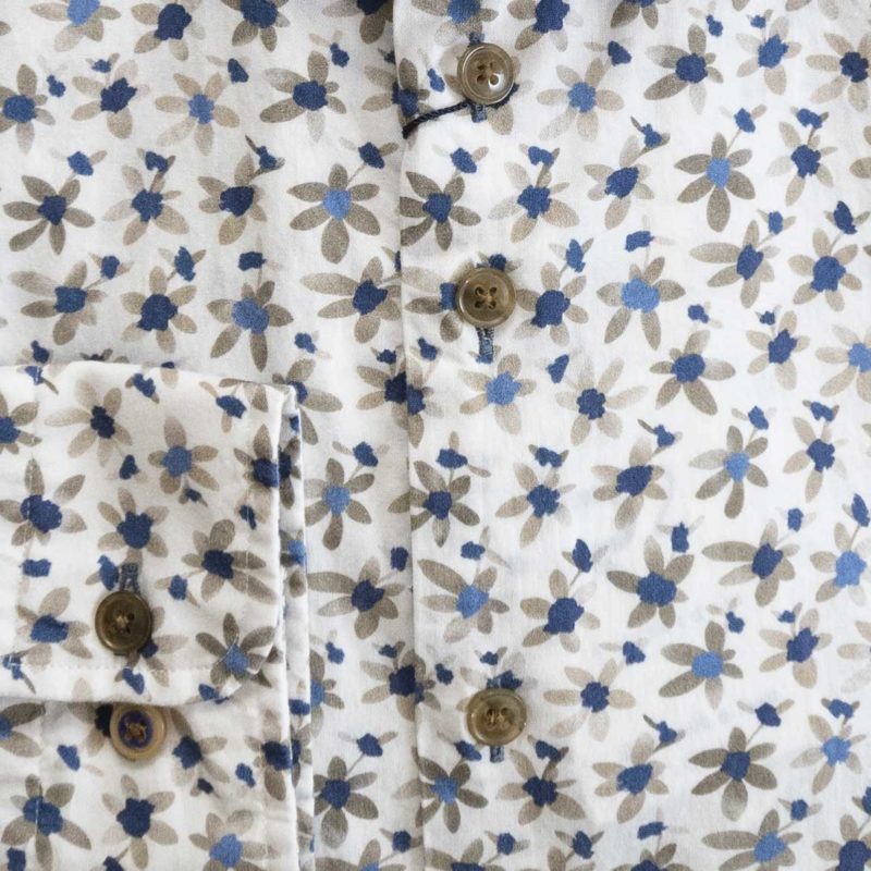 R2 shirt with small blue and brown flowers on a white background