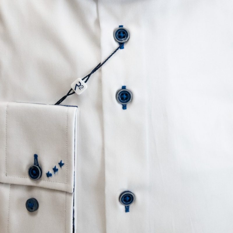 R2 shirt white with blue buttons and details and a blue floral lining to the collar