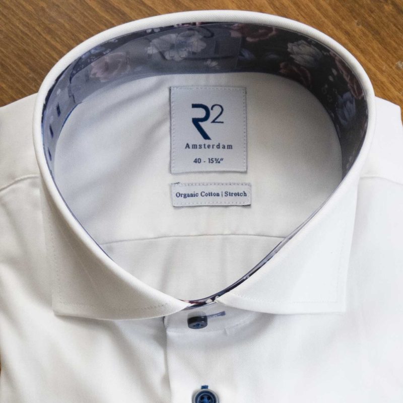 R2 shirt white with blue buttons and details and a blue floral lining to the collar