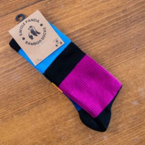 Swole Panda bamboo sock in black with pink, blue, yellow and green broad panels