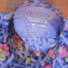 Giordano blue shirt with pink flower shapes and green foliage
