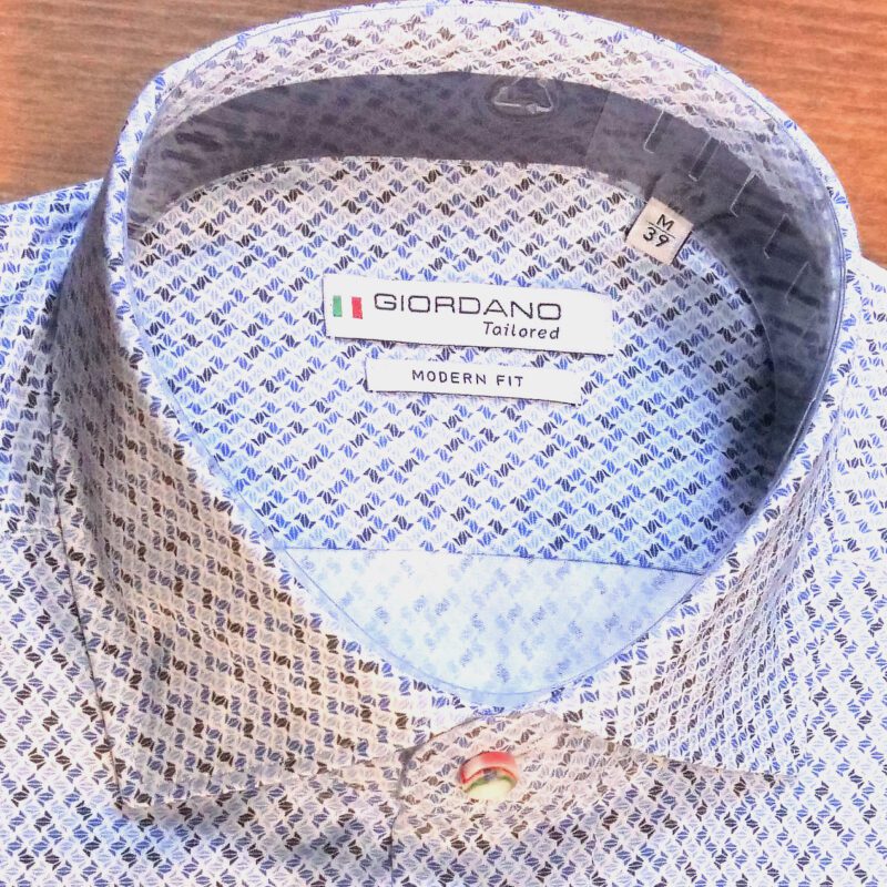 Giordano white shirt with tiny grey black and blue interlocking shapes