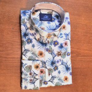 Eden Valley white shirt with large muted flowers on blue and green foliage with soft pink inner collar and cuffs