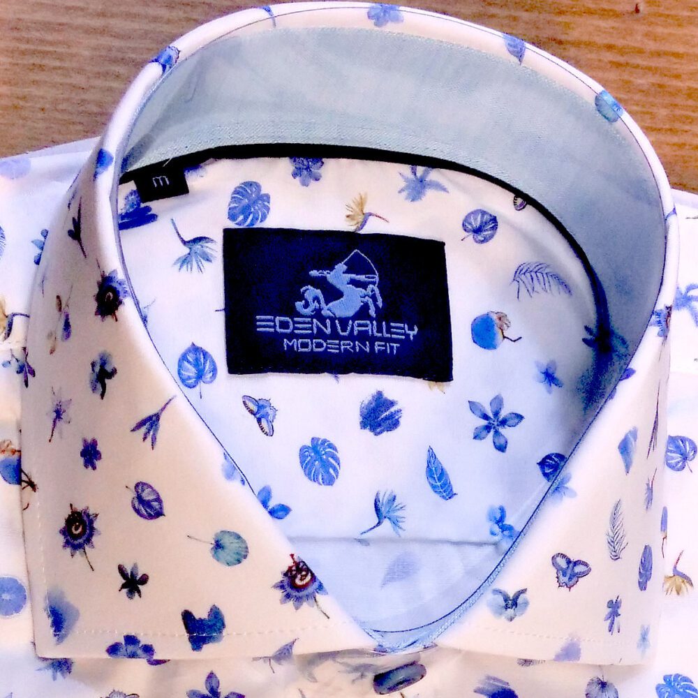 Eden Valley white shirt with small blue flowers and blue foliage with pale blue inner collar and cuffs