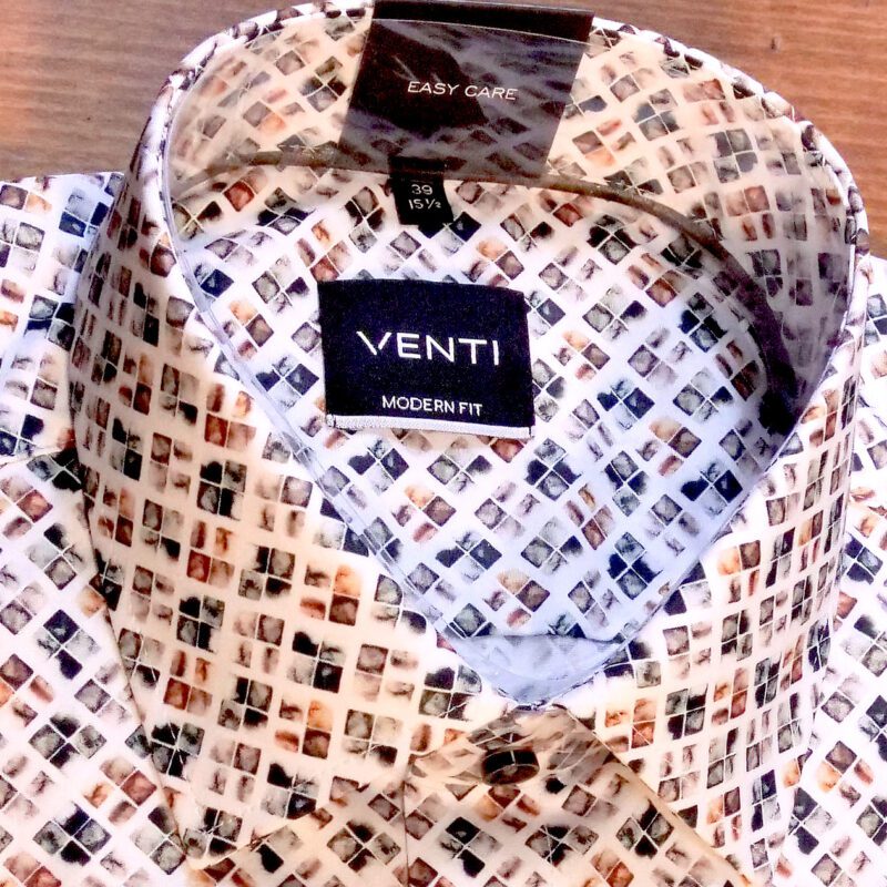 Venti white shirt with small blocks of images in black and white and sepia