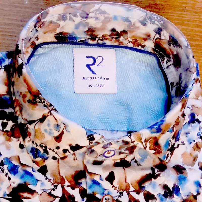 R2 white shirt with blue and brown foliage