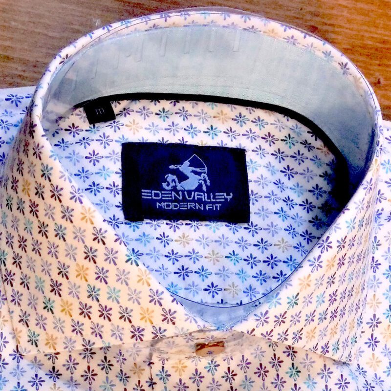 Eden Valley white shirt with small blue yellow and turquoise flowers