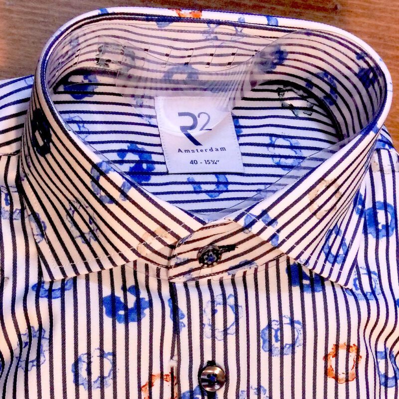 R2 white shirt with blue pinstripes and blue and orange round splodges