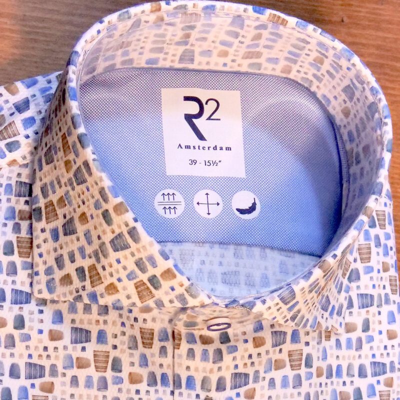R2 white shirt with tiny blue and brown barrels