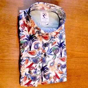 R2 white shirt with large bright images of exotic foliage and birds