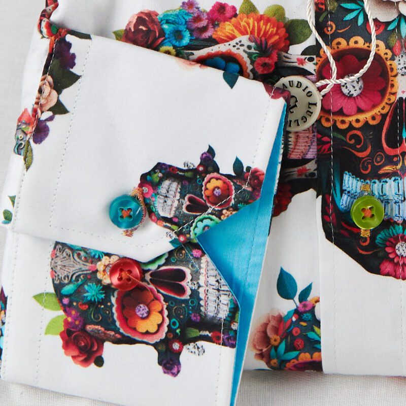 Claudio Lugli white shirt with intricate colourful skulls and a bright blue lining from Gabucci Bath