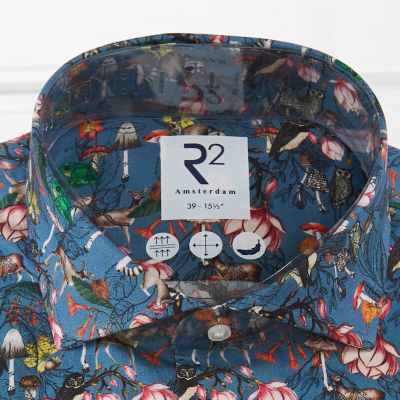 R2 mid blue shirt with small colourful mushrooms deer birds frogs and foliage from Gabucci Bath