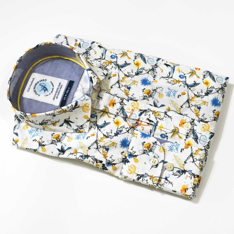 A Fish Named Fred white shirt with large yellow birds and foliage, from Gabucci Bath