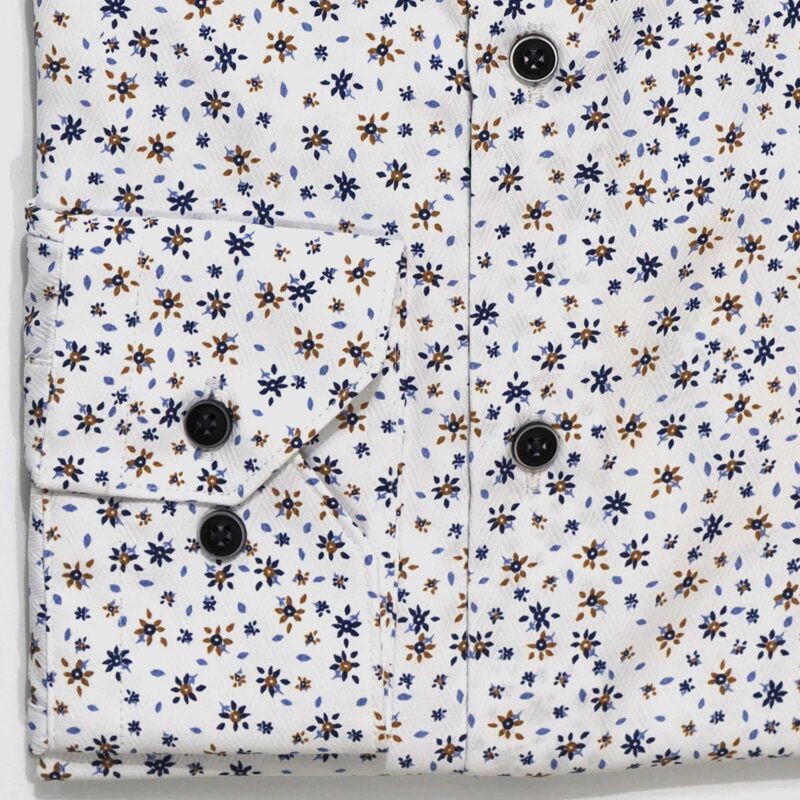 Giordano shirt with tiny navy blue and brown flowers on white from Gabucci Bath.