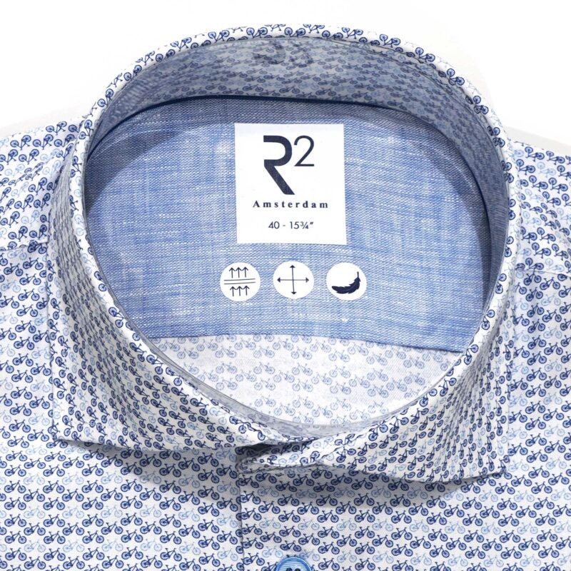 R2 blue shirt with rows of tiny blue bicycles from Gabucci Bath