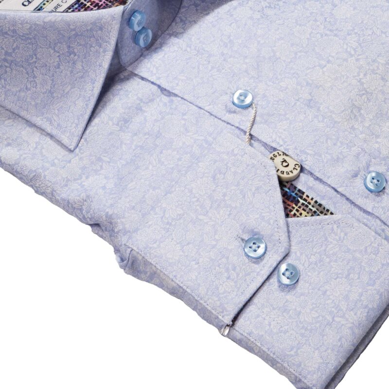 Claudio Lugli shirt in pale blue with white flowers and patterned lining from Gabucci Menswear in Bath