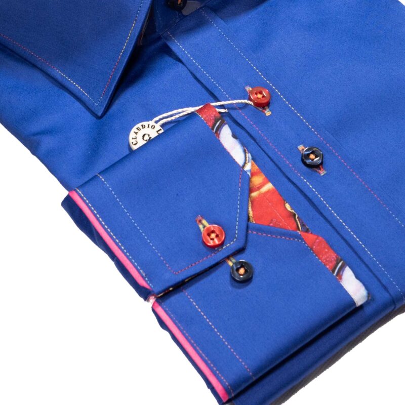 Claudio Lugli blue shirt with colourful pattern on lining and pleated panel on back from Gabucci Bath