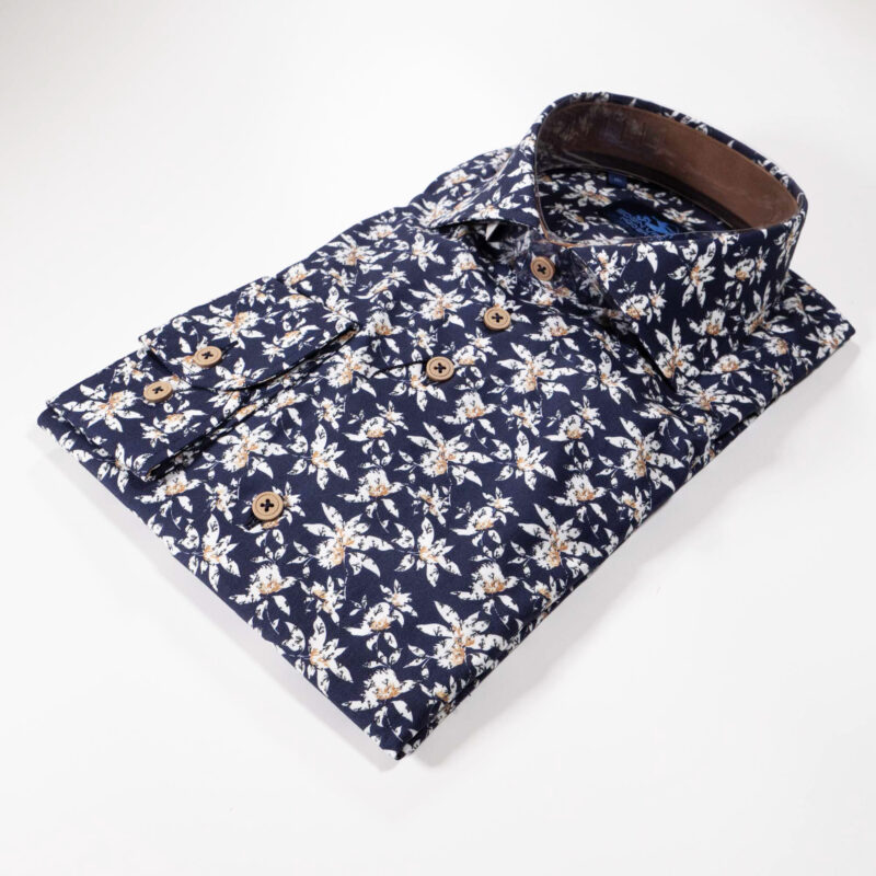 Eden Valley navy blue shirt with large white flower shapes with foliage underneath