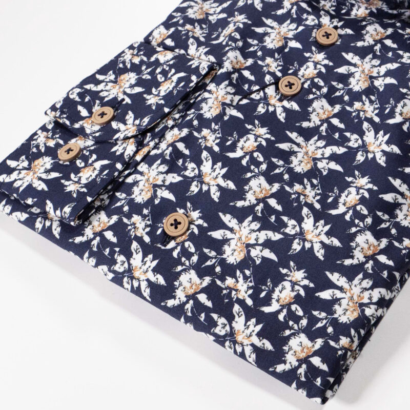 Eden Valley navy blue shirt with large white flower shapes with foliage underneath