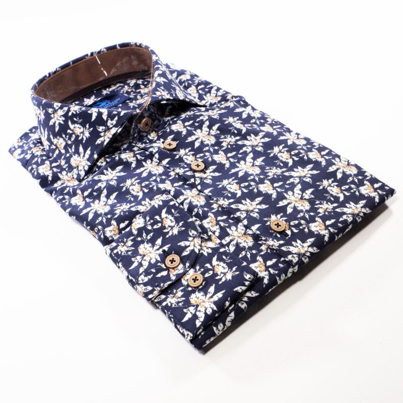 Eden Valley navy blue shirt with large white flower shapes with foliage underneath