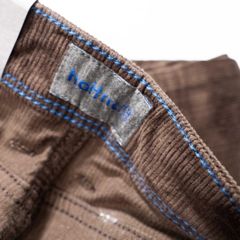 Hattric brown cord trouser with contrasting blue stitching and traditional 5 pocket design.