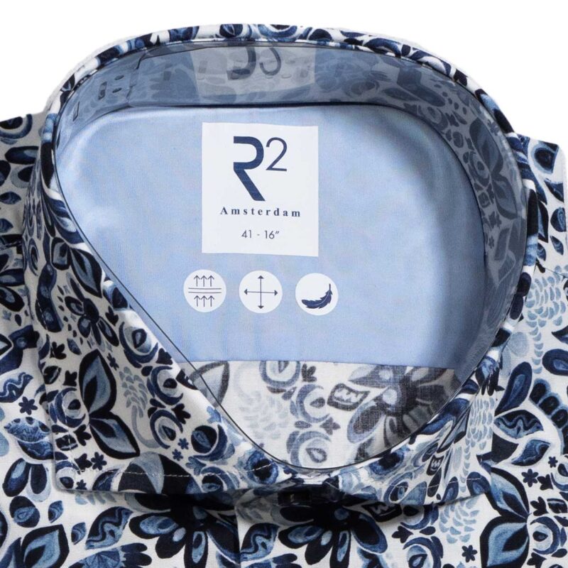 R2 white shirt with large blue flowers and foliage. From Gabucci Menswear in Bath