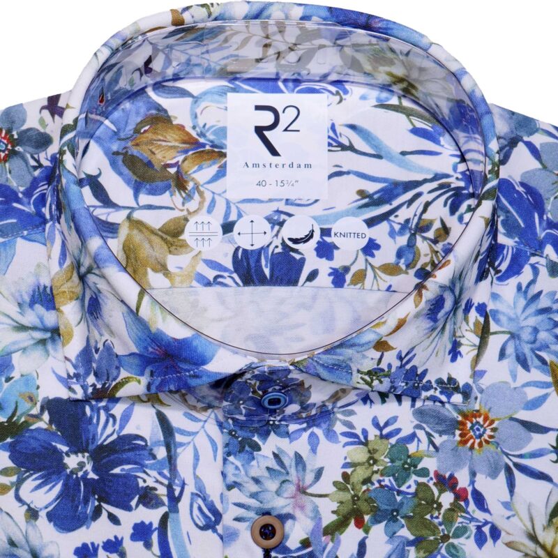 R2 white shirt with large beige and white summer flowers on blue foliage