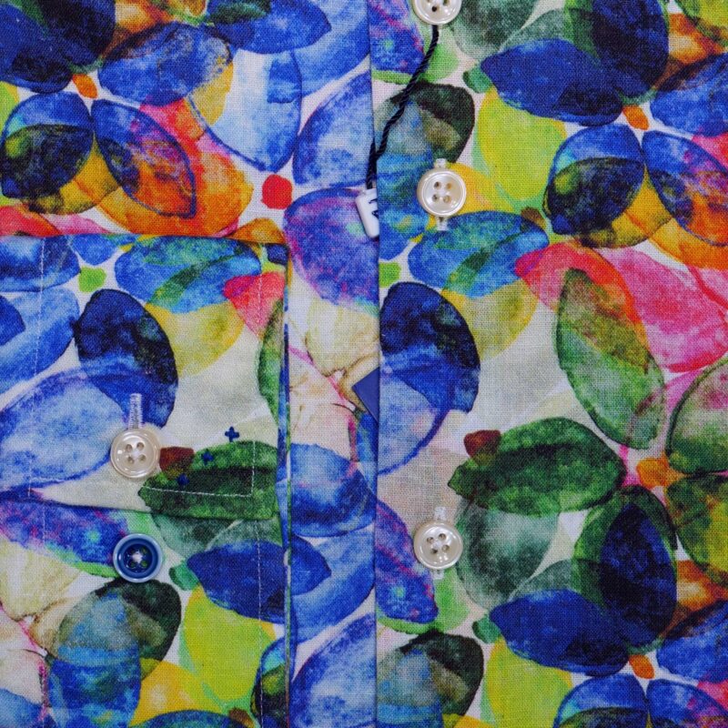 R2 beige linen shirt with large petals and leaves in blues and greens, reds and yellows. From Gabucci Menswear in Bath