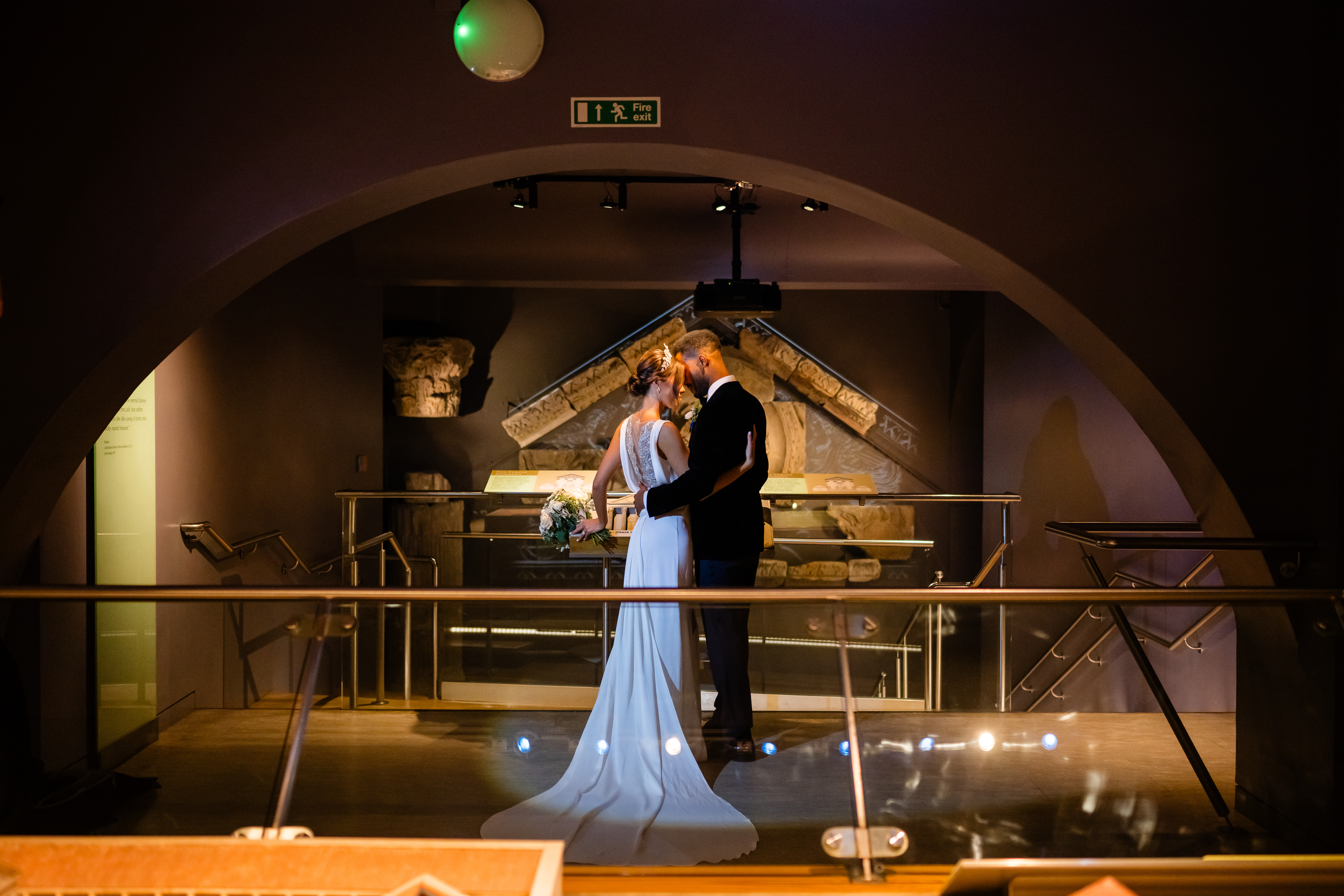Image of wedding couple at the Royal Baths, Bath, the groom wears suit and shirt from Gabucci Menswear Bath, for Bath Royal Baths, shot by RICH HOWMAN & ELAN IMAGES LTD